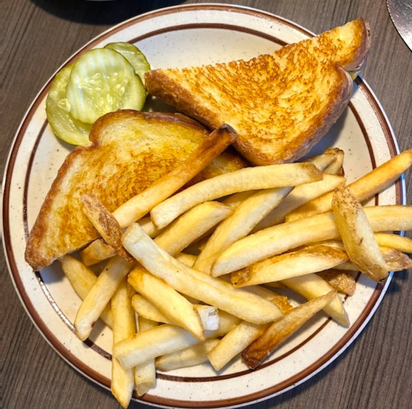 The grilled cheese and fries is on the children's menu at the Coffee Cup.