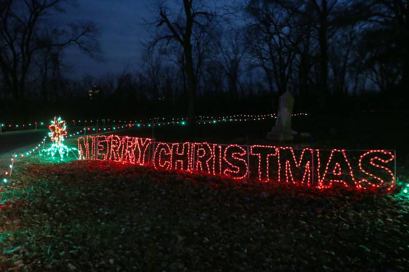 A Merry Christmas sign glows near the end of the Celebration of Lights display on Thursday, Dec. 8, 2022 at Rotary Park in La Salle.