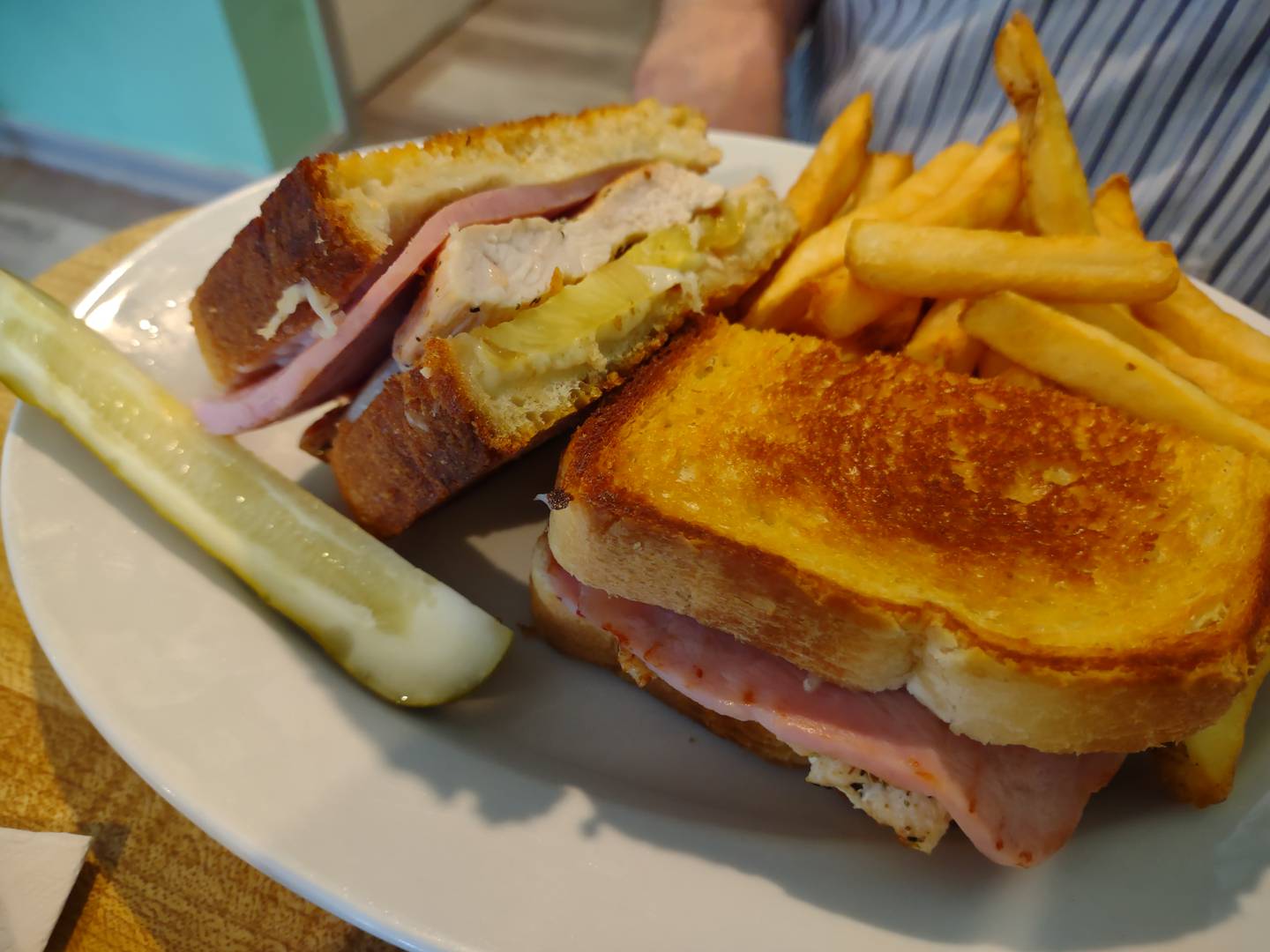 The Hawaiian chicken melt includes a seasoned chicken breast with a slice of ham, sliced pineapple and mozzarella cheese on sourdough bread.