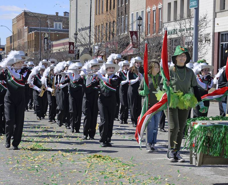 The La Salle-Peru High School Marching Band at least stayed warm by moving as they march down First Street in La Salle during Saturday’s St. Patrick’s Day Parade, March 12, 2022.