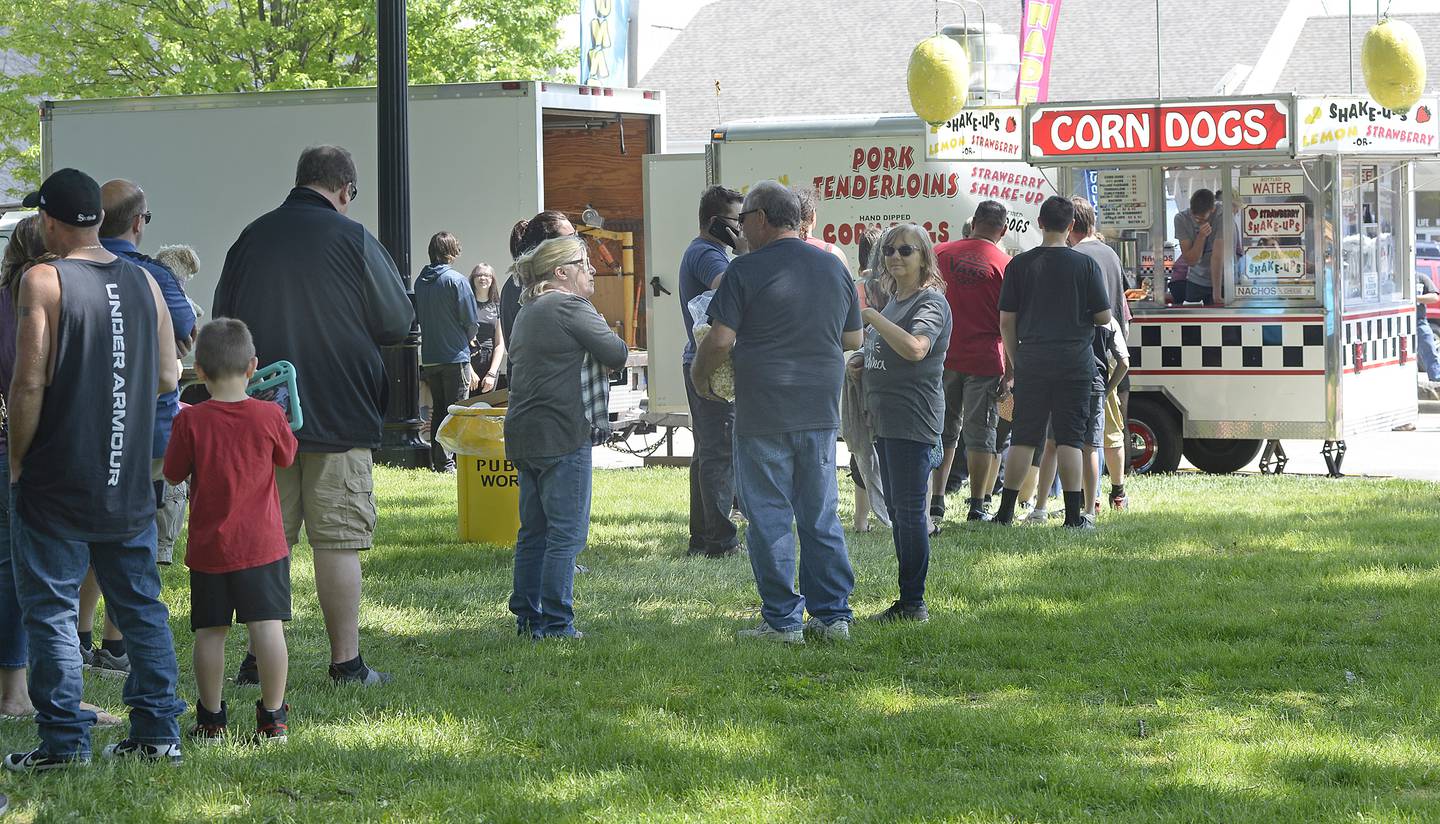 Some lines were long at many of the 19 different food trucks during Streator’s Food Truck Festival at City Park, including this one for Cruisin' Concessions. Live entertainment and 40 craft vendors also were on hand.