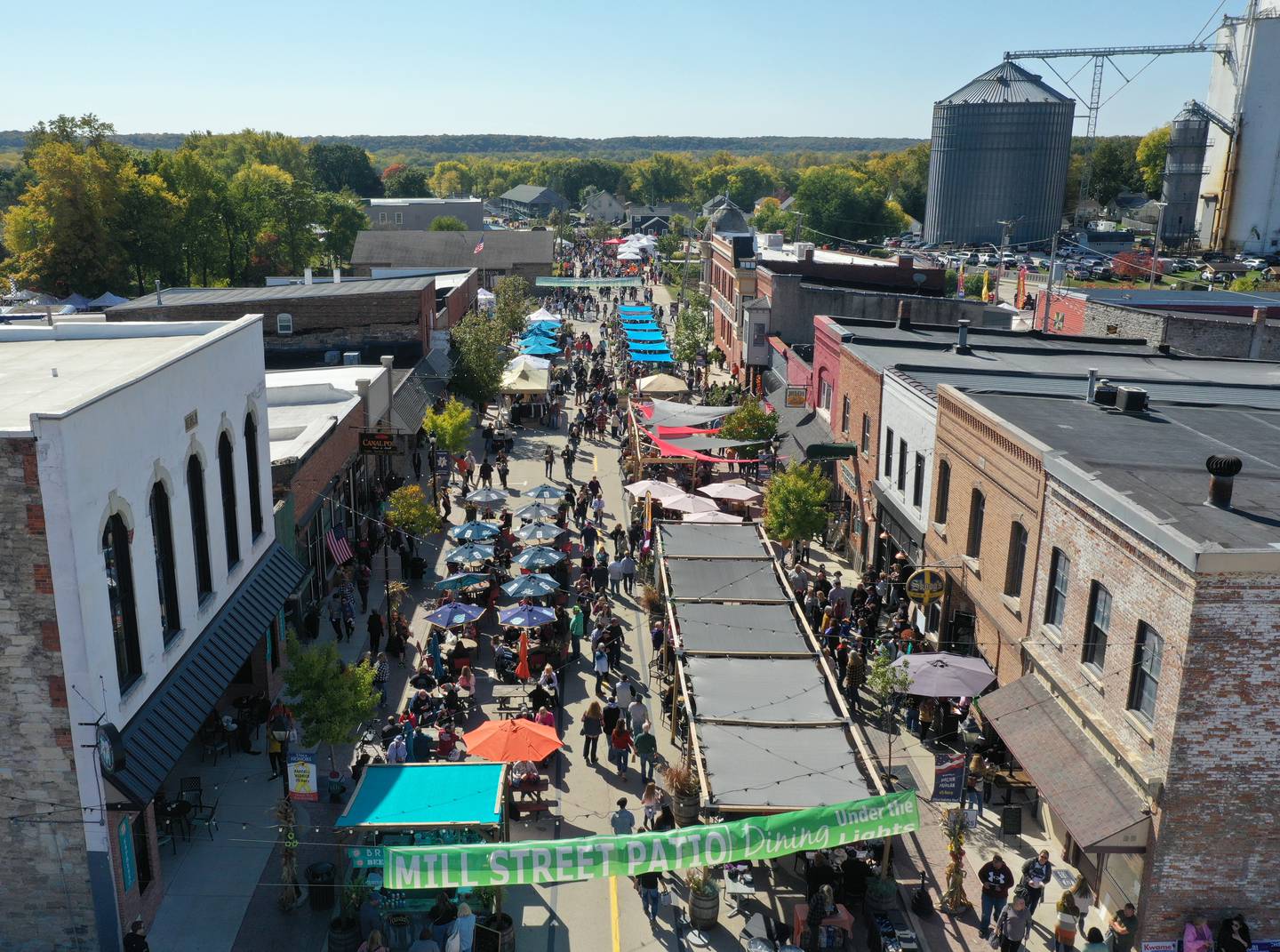 A large crowd gathers on Mill Street for the 52nd annual Burgoo festival on Sunday, Oct. 9, 2022 in Utica.