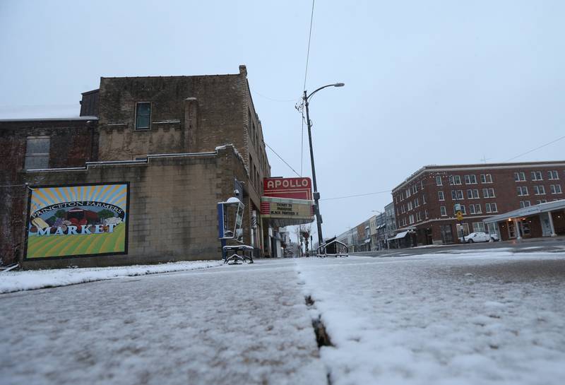 Snow covers the sidewalk in front of the Apollo Theater on Tuesday, Nov. 15, 2022 downtown Princeton.