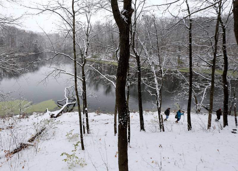 Hikers walk along the bottom trail at Matthiessen Lake on Tuesday, Nov. 15, 2022 at Matthiessen State Park in Oglesby.