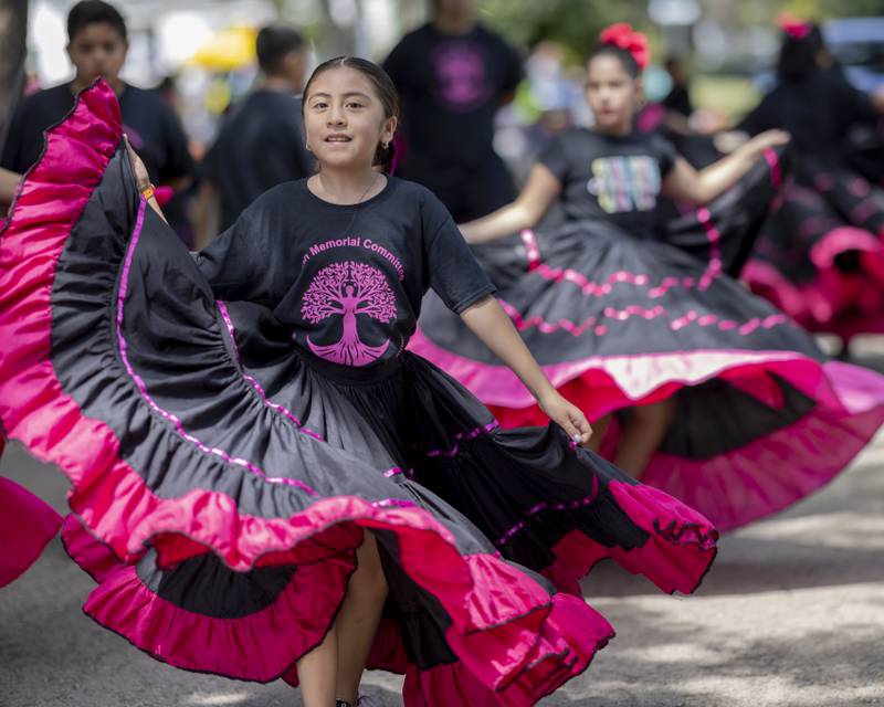 A member of Ballet Folklorico performs traditional Spanish dances during the Mendota Sweet Corn Festival parade on August 11, 2024.