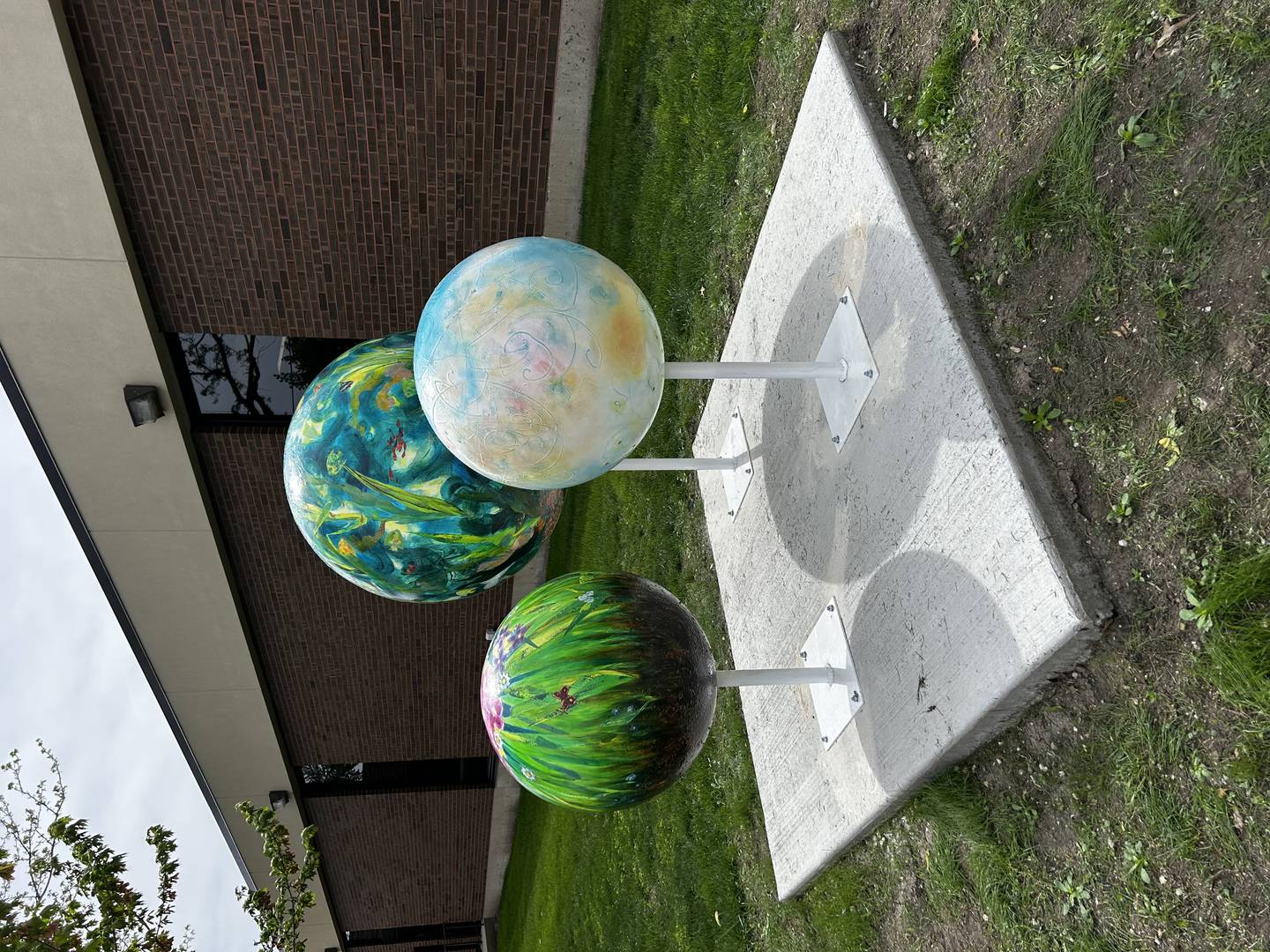 Natalie Zelman’s marbles depict swirls of abstract patterns and plant life, located at the Reddick Library.