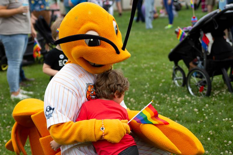 Fan hugs “South Claw Sam” Mascot of Pistol Shrimp on Saturday, June 8, 2024 at Jordan Block Park in Ottawa.