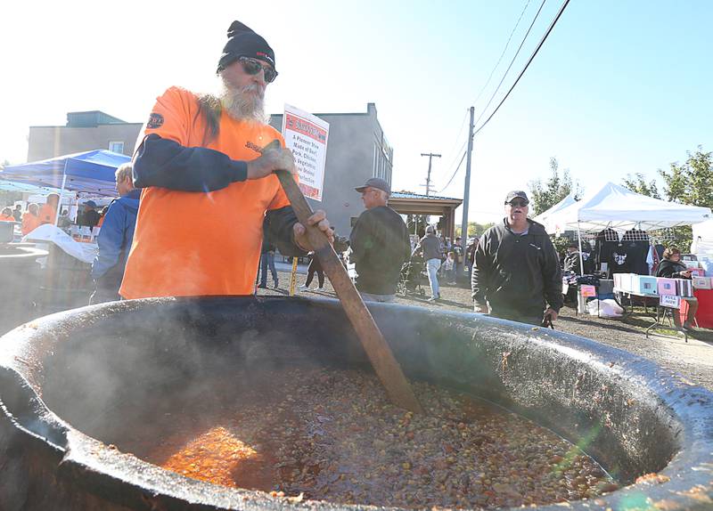 Volunteer Bob Erwin stirs a large kettle of Burgoo during the 52nd annual Burgoo on Sunday, Oct. 9, 2022.