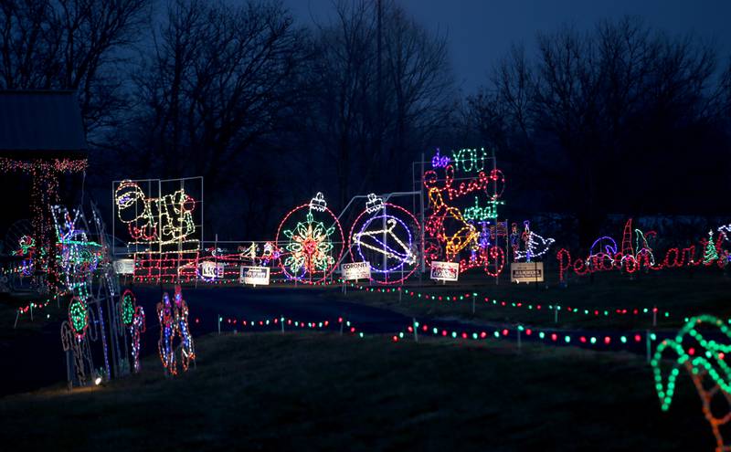 The Celebration of Lights Christmas drive-through display glows at twilight on Thursday, Dec. 8, 2022  at Rotary Park in La Salle