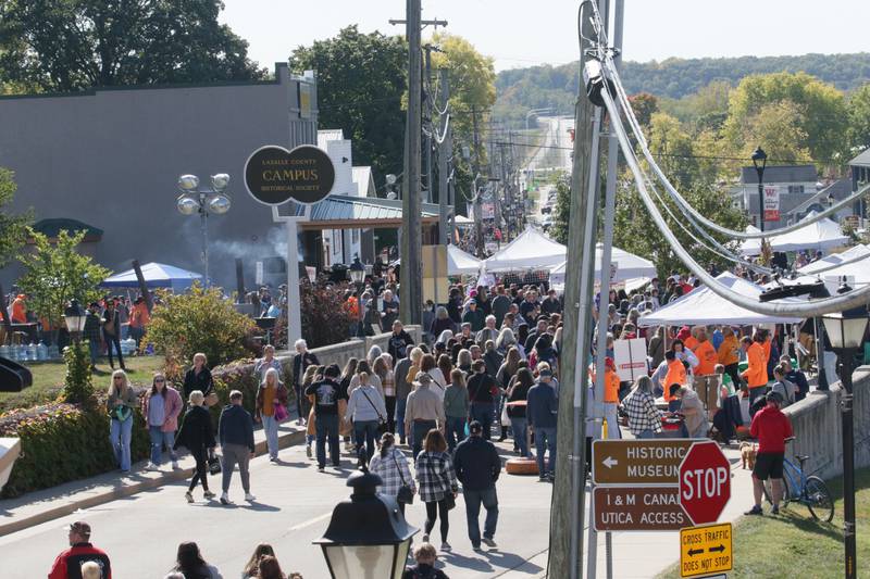 A large crowd gathers near the La Salle County Historical Museum for the 52nd annual Burgoo festival on Sunday, Oct. 9, 2022 in Utica.