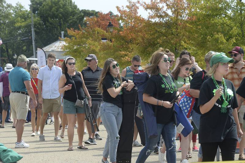 Long lines formed to enter Illinois' largest wine festival Saturday, Sept. 17, 2022, in Utica. Nice weather helped to draw thousands to the event.
