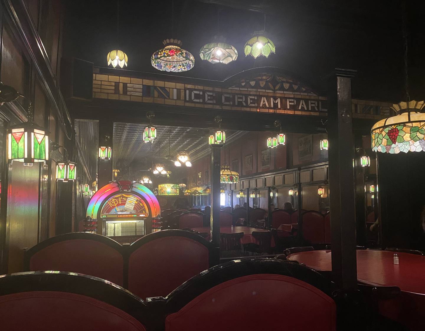 Stained glass, classic movie posters, cozy booths, mirrors and the mouth-watering smell of the pizza ovens blend together to form the aesthetic at Ottawa's Bianchi's Pizza.