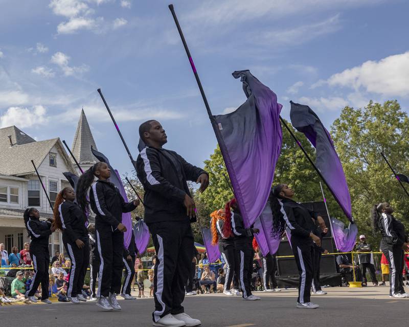 Members of the South Shore Drill Team from Chicago perform in front of the Mendota Elks lodge after the parade on August 11, 2024.