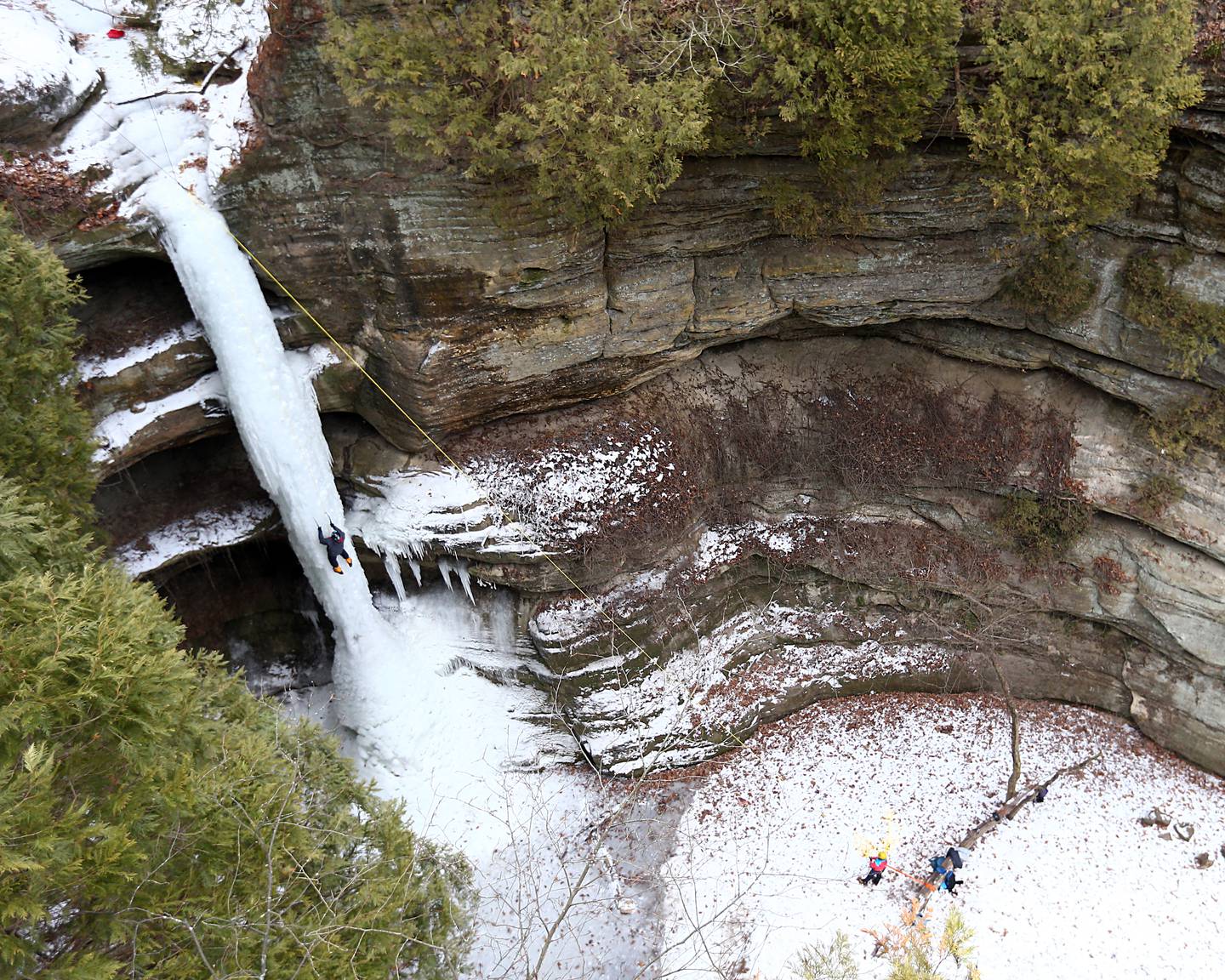Joel Taylor, of Monee, climbs up a 90 foot frozen waterfall at Wildcat Canyon in Starved Rock State Park on Friday Jan. 14, 2022 near Utica. Ice climbing is only allowed when ice columns are suitable for climbing. Climbers will be the ice-falls this weekend in Wildcat, La Salle and Ottawa Canyons in the park.
